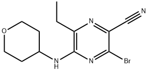 3-bromo-6-etil-5-((tetrahidro-2H-piran-4-il)amino)pirazina-2-karbonitrilo